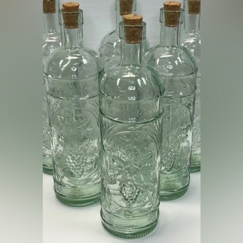 William Sonoma made in Spain Embossed Clear Green Glass Bottles set of 3